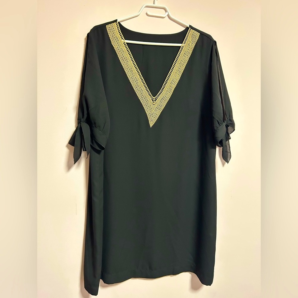 Elegant Black Dress with Gold Trim